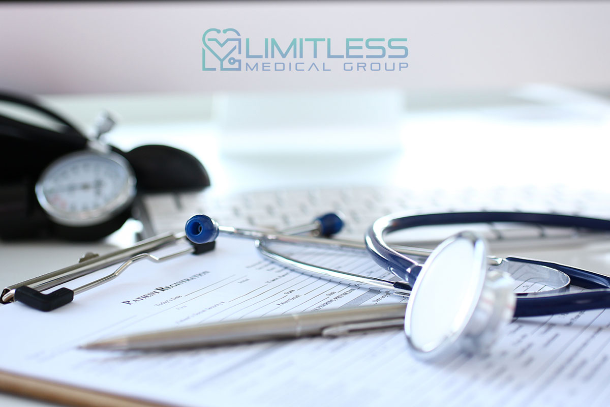 doctor's desk with instruments and paperwork.